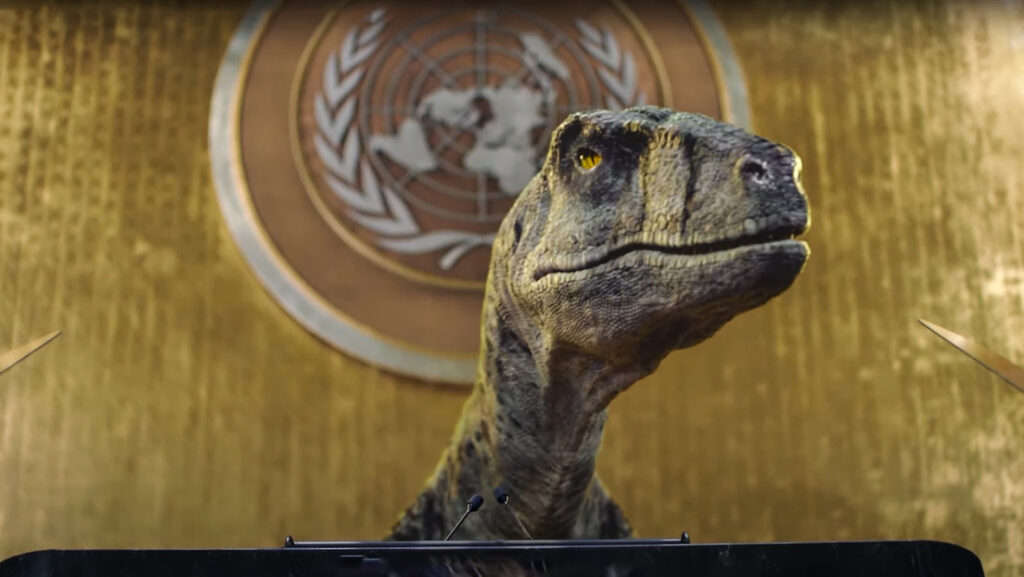 Un dinosaurio ‘irrumpe’ en la sala de la Asamblea General de la ONU para advertir sobre el «desastre climático»