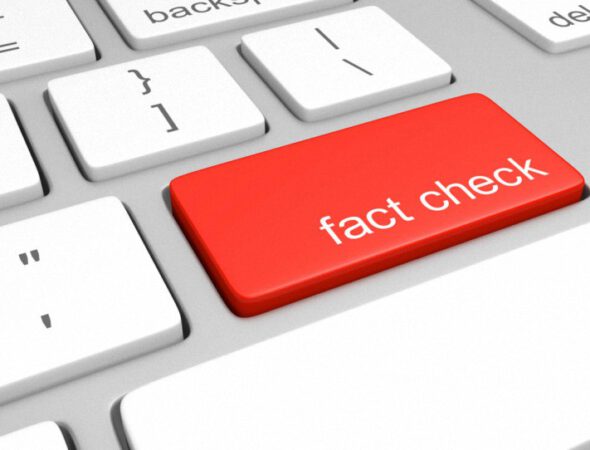 Key on a computer keyboard for fact checking statements