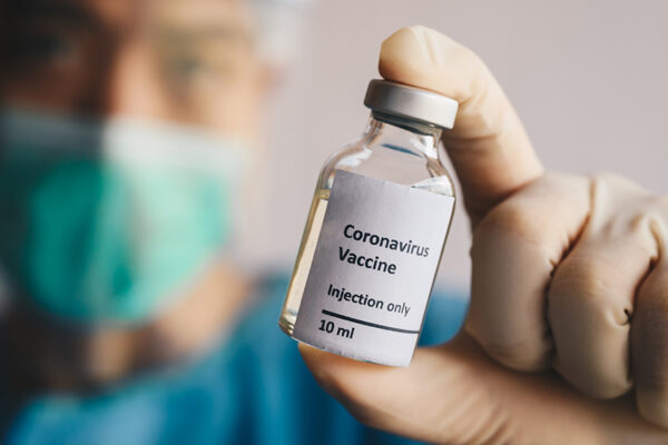 Doctor-Mask-Close-Up-Covid-19-Vial-Vaccine