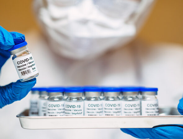 Lab-Tech-Vaccine-Vials-Covid-19