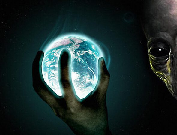 alien-holding-earth