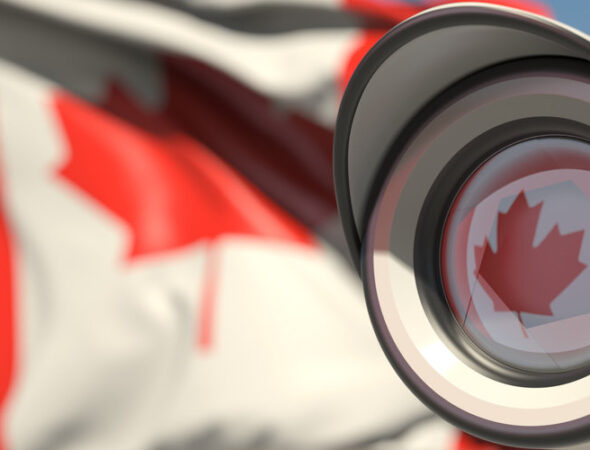National,Flag,Of,Canada,And,Cctv,Camera.,Surveillance,System,Conceptual