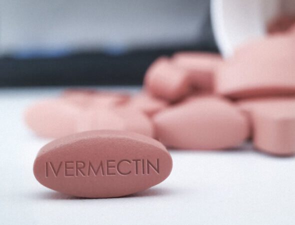 Ivermectin,Red,Pill,Medication,On,White,Table,Medical,Concept,Of