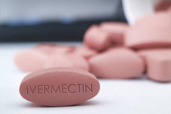 Ivermectin,Red,Pill,Medication,On,White,Table,Medical,Concept,Of