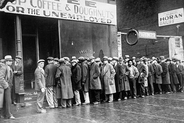 Great-Depression-Men-Lined-Up-Outside-A-Soup-Kitchen